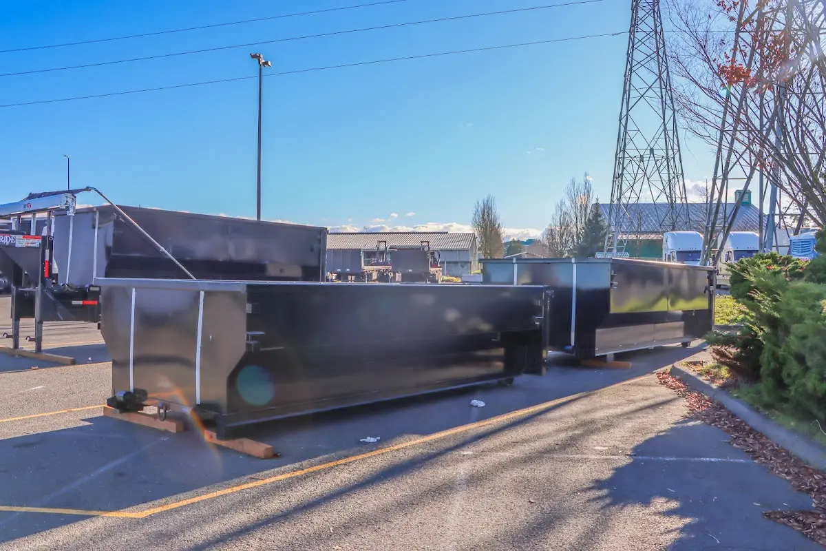 Roll-off dumpster ready for waste disposal at job site for 12 Yard Dumpster Rental in Manor